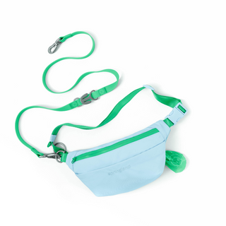 Light blue fanny pack walking bag with green leash, poop bag holder, and adjustable strap on white background